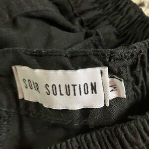Sour solution pants medium never worn